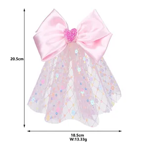 Pince à cheveux nœud rose avec voile en résille et paillettes, dimensions 18,5x20,5cm