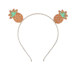 Sparkly silver headband featuring sweet embroidered pineapple motifs for children