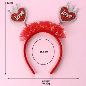 Dettaglio cerchietto rosso con corone glitterate Love a molla per feste bambini