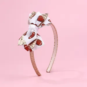 Serre-tête rose à paillettes football américain avec double nœud pour coiffure fille