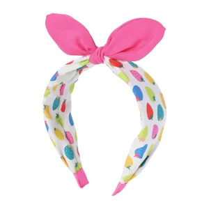 Serre-tête fraise pour enfants avec grand nœud fuchsia et base en tissu blanc antidérapant