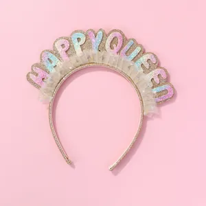 Detail of Happy Queen headband with colorful sequins and mesh ruffles on pink background
