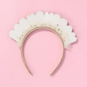 Close-up of Happy Queen headband with gold glitter stars and white scalloped felt detail