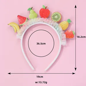 Kids fruit headband with sequins, mesh lace, and colorful charms on pink background