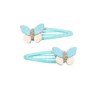 Set di fermagli per capelli a farfalla glitterati per bambine in azzurro e crema con clip
