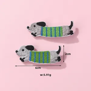 Embroidered dachshund dog hair clips for kids with blue and green striped clothes