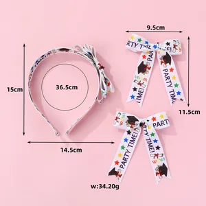 Graduation theme hair accessory set with headband and ribbon clips on pink background