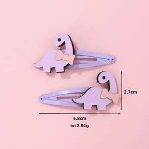 Lot de deux pinces à cheveux dinosaure violettes pour filles avec nœuds mignons