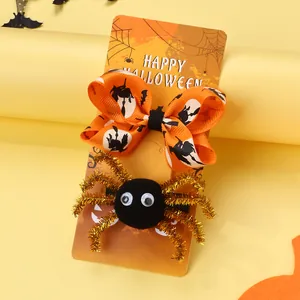 Halloween-Haarspangen-Set mit orangefarbener Hexenschleife und flauschiger Spinne