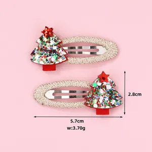Detail of Christmas tree hair clips with colorful sequins and size markers 5.7cm