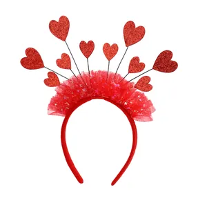 Cerchietto festivo rosso con rete di paillettes e cuori glitterati per bambine