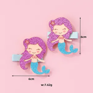Detail of glitter mermaid hair clips with dimensions 6cm and 7.62g weight