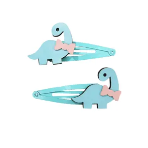 Lot de deux pinces à cheveux dinosaure bleu clair avec nœuds roses pour décoration enfant