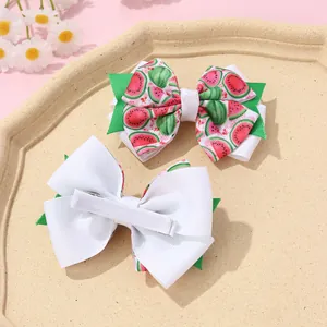 Detail of watermelon print double layered hair bows with secure alligator clips