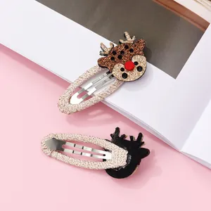 Detail of Christmas reindeer sequin hair clips for children with soft fabric-wrapped BB clips