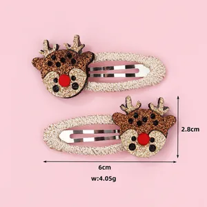 Detail showing 6cm reindeer Christmas hair clips with embroidery and size measurements