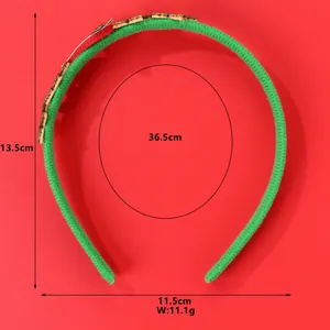 Tabella taglie dettagliata per cerchietto natalizio verde con altezza 13,5 cm e peso