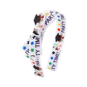 Preppy graduation bow headband with academic caps, scrolls and Party Time prints