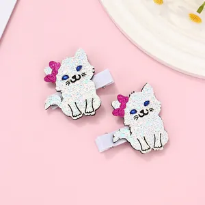Glitter cat hair clips for girls with pink sequin bow and blue gemstone eyes detail