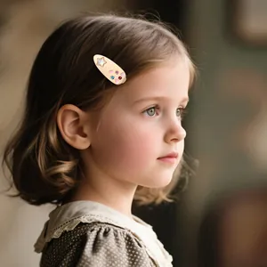 Close-up of a girl wearing a vintage heart-shaped hair clip with colorful rhinestones