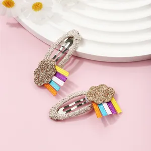 Cute kids hair clip set with glittery gold cloud and colorful ribbon rainbow