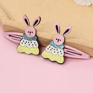 Détail de barrettes lapin à paillettes pour filles en lots rose, bleu, blanc et jaune