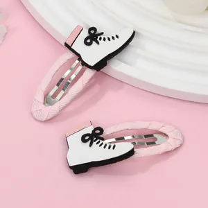 Set de dos clips para el pelo con forma de patines rosas con lentejuelas y clips BB
