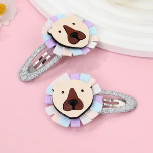 Detailed view of handmade lion hair clips with colorful ribbon mane for girls