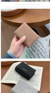 Gros plan de portefeuilles pliables en simili cuir mat avec lettrage Forever Sunshine