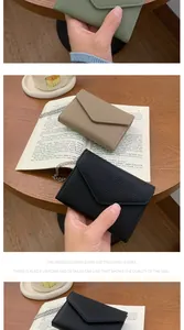 Detailed view of three lychee pattern envelope wallets in green, khaki, and black
