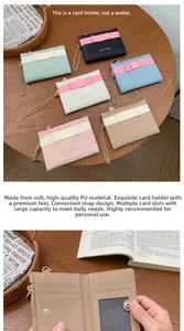 Detail of cute PU leather wallet with multiple card slots and secure metal snap closure