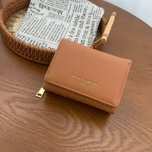 Classic brown crossgrain leather short wallet with gold zipper and tri-fold design