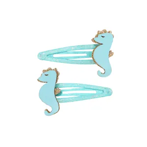 Paire de barrettes bleues à paillettes avec hippocampe mignon et sequins dorés brillants