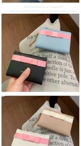 Detailed view of four colorful PU leather wallets with elegant bow decorations and zippers