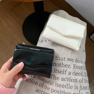 Quilted leather envelope wallet in black and beige with silver zipper closure