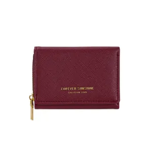 Short burgundy Saffiano leather wallet with gold zipper and embossed lettering