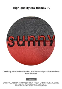 Detailed macro view of sunny embroidery on durable red and black PU leather wallet