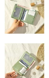 Sage green short wallet with multiple card slots and a secure zipper coin compartment