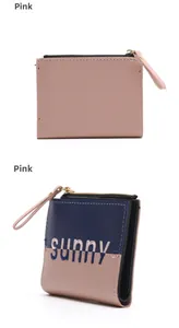 Close-up of stylish PU leather mini wallets with zipper closure and sunny letter print