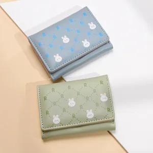 Short tri-fold women's wallets with cute cartoon bunny and blue-green leather finish