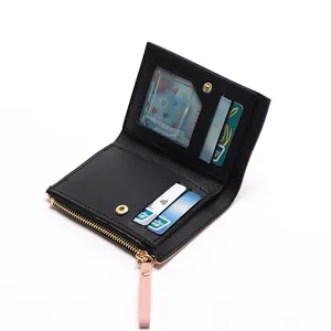 Slim pink and black bifold faux leather wallet for women with card slots and coin pocket