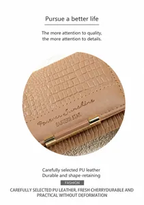 Detail of khaki PU leather wallet featuring crocodile texture and gold metal buckle