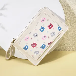 Cute off-white PU leather wallet with colorful cartoon bears on a round display stand