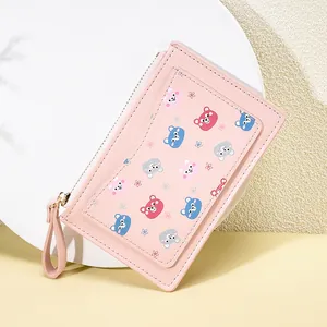 Pink cartoon bear printed wallet for women with zipper closure and wrist strap