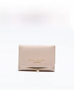Front view of pink faux leather wallet with gold inscription and pearl charm detail