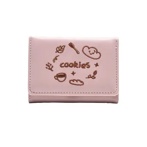 Portefeuille rose pour femme à trois volets avec broderie élégante sur similicuir