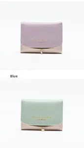 Detail of multi-functional women's wallets with pearl pendant and gold-tone metal trim