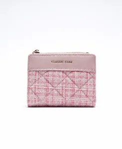 Detail of pink tweed and leather wallet with gold Classic Star embossed logo
