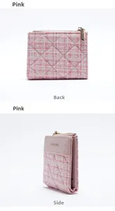 Detail of pink tweed quilted short wallet with gold zipper and smooth classic star logo
