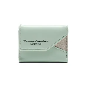 Portafoglio donna compatto a tre ante in pelle PU verde menta con dettagli glitter oro